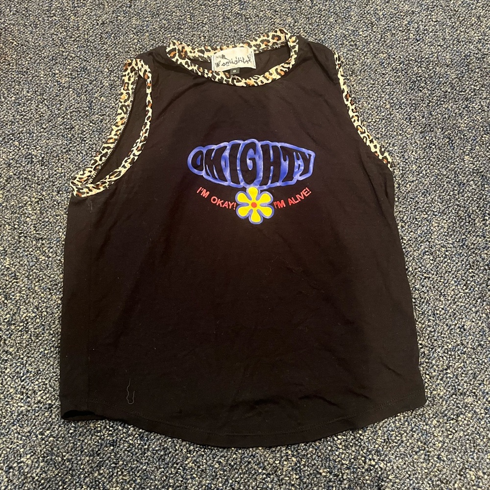 Omighty tank top with cheetah print around arm and neck hole